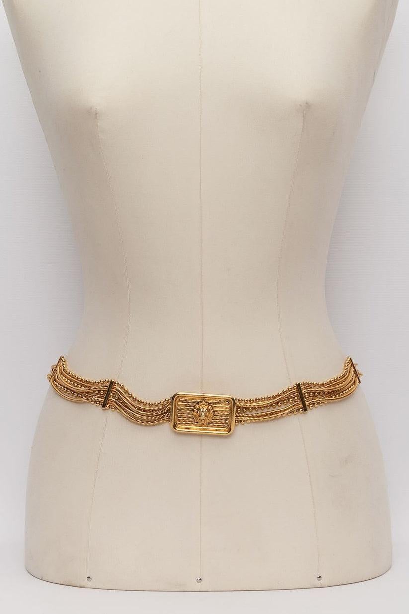 Chanel (Made in France) Belt comprised of gilded metal chains.

Additional information: 
Dimensions: Length: 75 cm (29.52