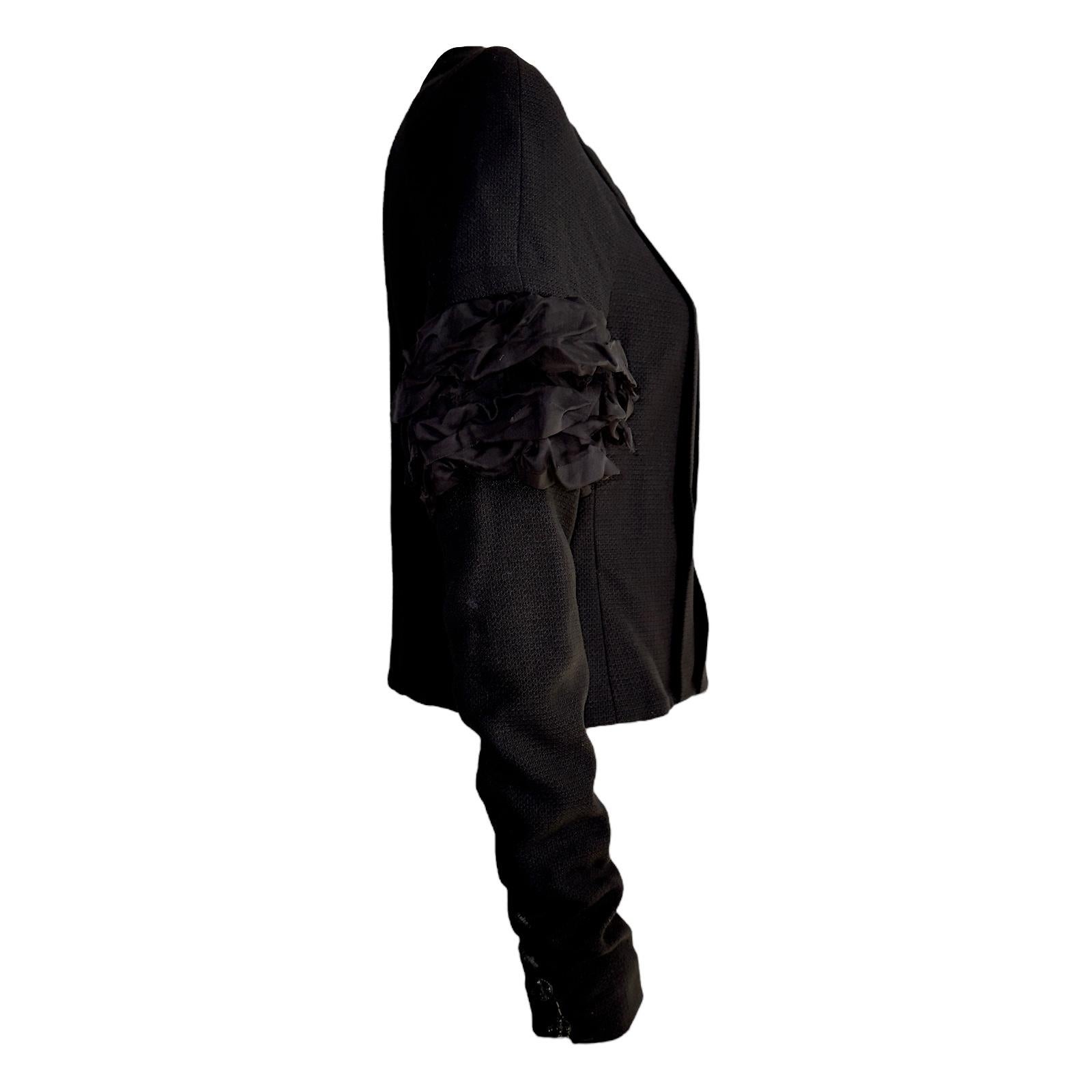 Beautiful CHANEL jacket designed by Karl Lagerfeld
A true CHANEL signature item that will last you for many years
The classic little black jacket LBJ 
Closes in front with jeweled CC logo buttons
Fabric created by Maison Lesage exclusively for