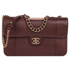 CHANEL Borsa con patta singola in pelle di lucertola e agnello trapuntato dal bordo perfetto