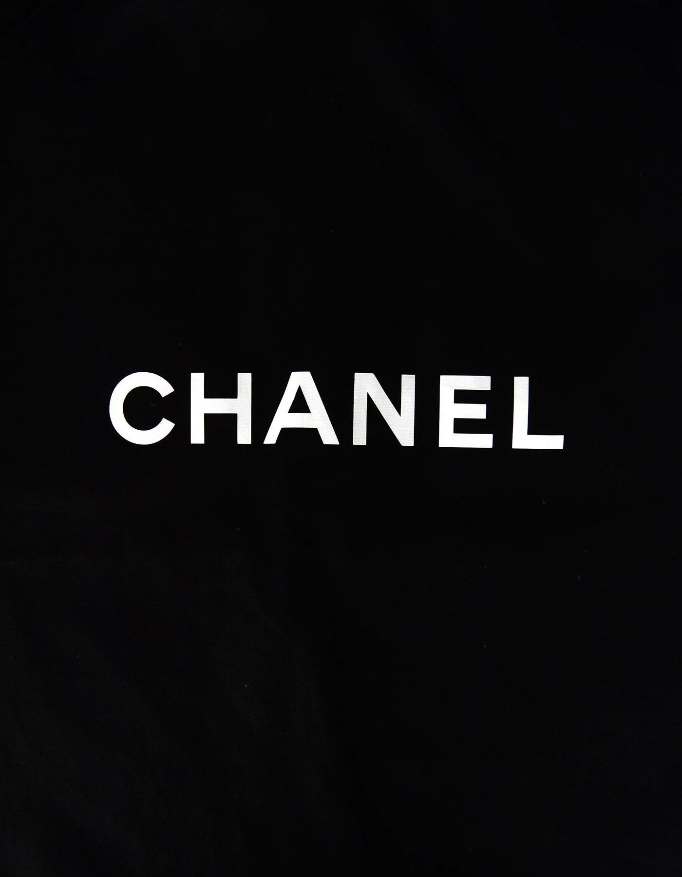 Chanel Logo Black Canvas Garment Bag & Coat CC Velvet Hanger Set

Color: Black, white, gold
Hardware: Goldtone
Materials: Canvas, metal, plastic, velvet
Closure/Opening: Back zipper
Overall Condition: Excellent pre-owned condition 
Includes:  Canvas