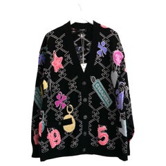 Chaqueta de cachemira Chanel Logo & Charm Primavera 2022 22P