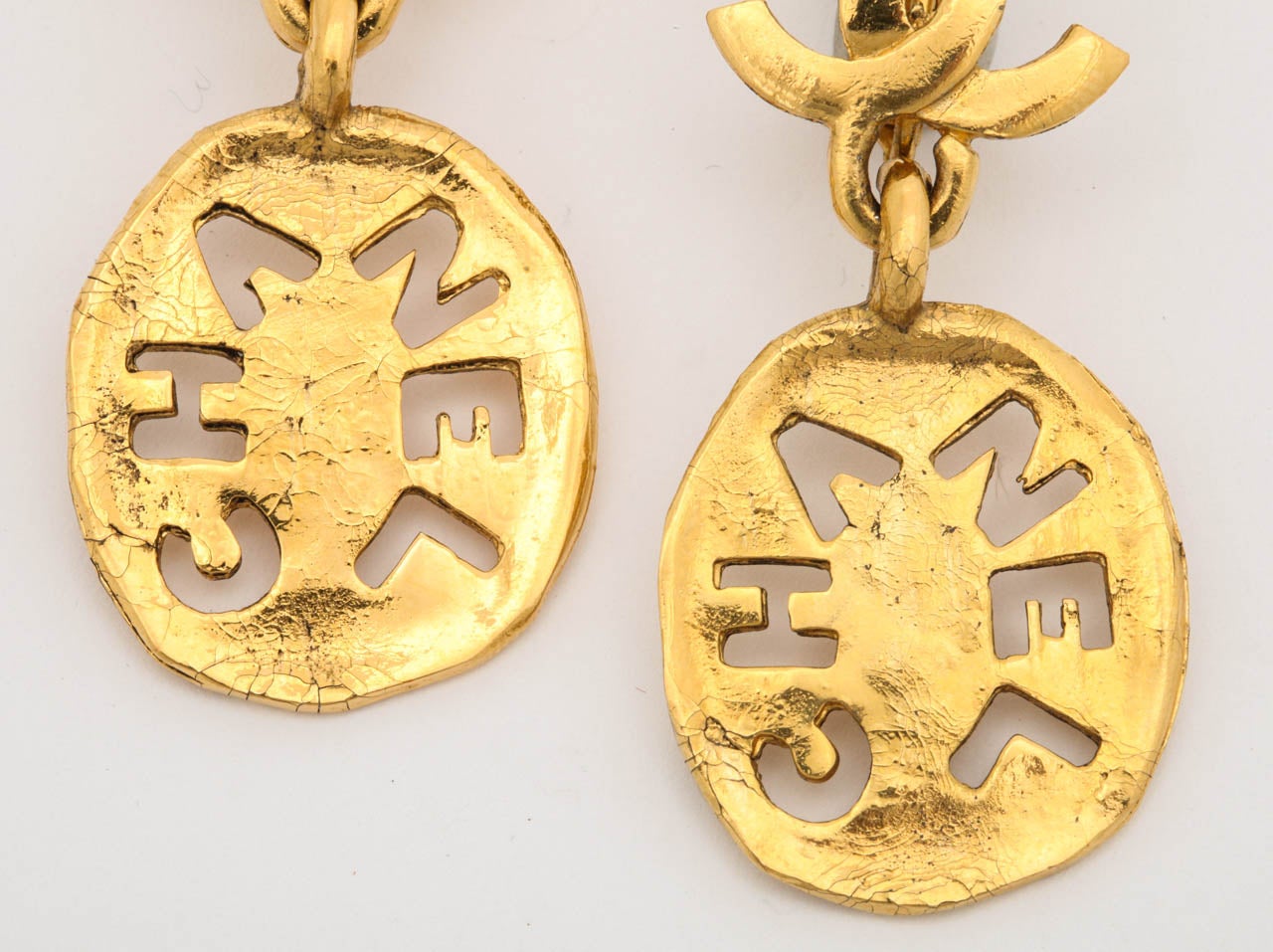Chanel Logo Cutout Dangling Earrings In Good Condition In Chicago, IL