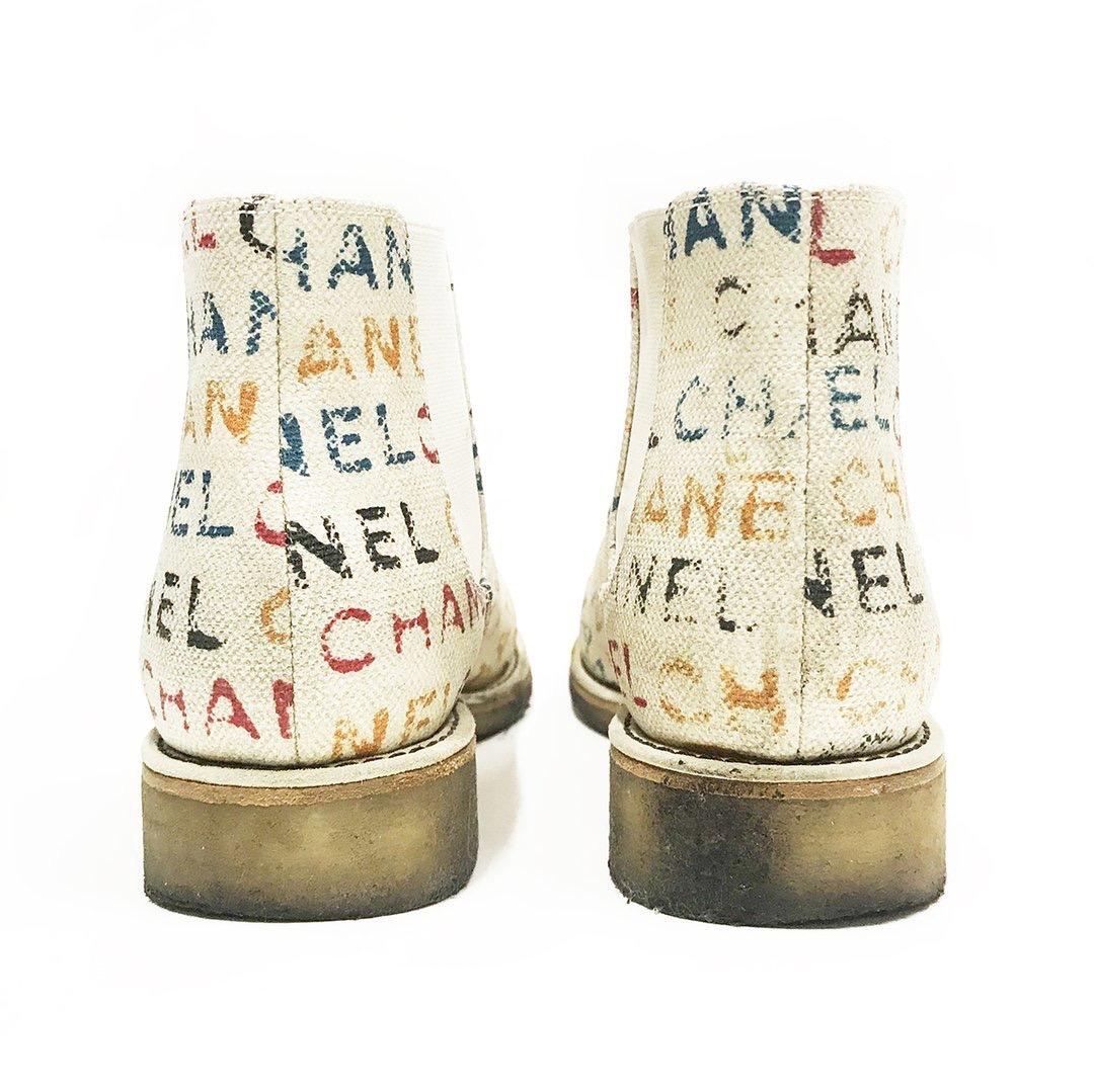 chanel logo boots