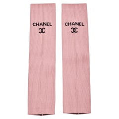 Guêtres en tricot rose avec logo Chanel