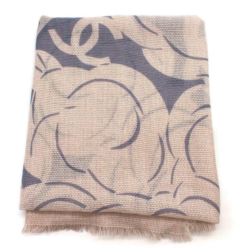 Chanel Logo-Print Silk and Cashmere-Blend Scarf

-Cashmere and silk blend scarf
-Beige scarf with blue pattern
-Abstract floral pattern with 'CC' logos 

Please note, these items are pre-owned and may show signs of being stored even when unworn and