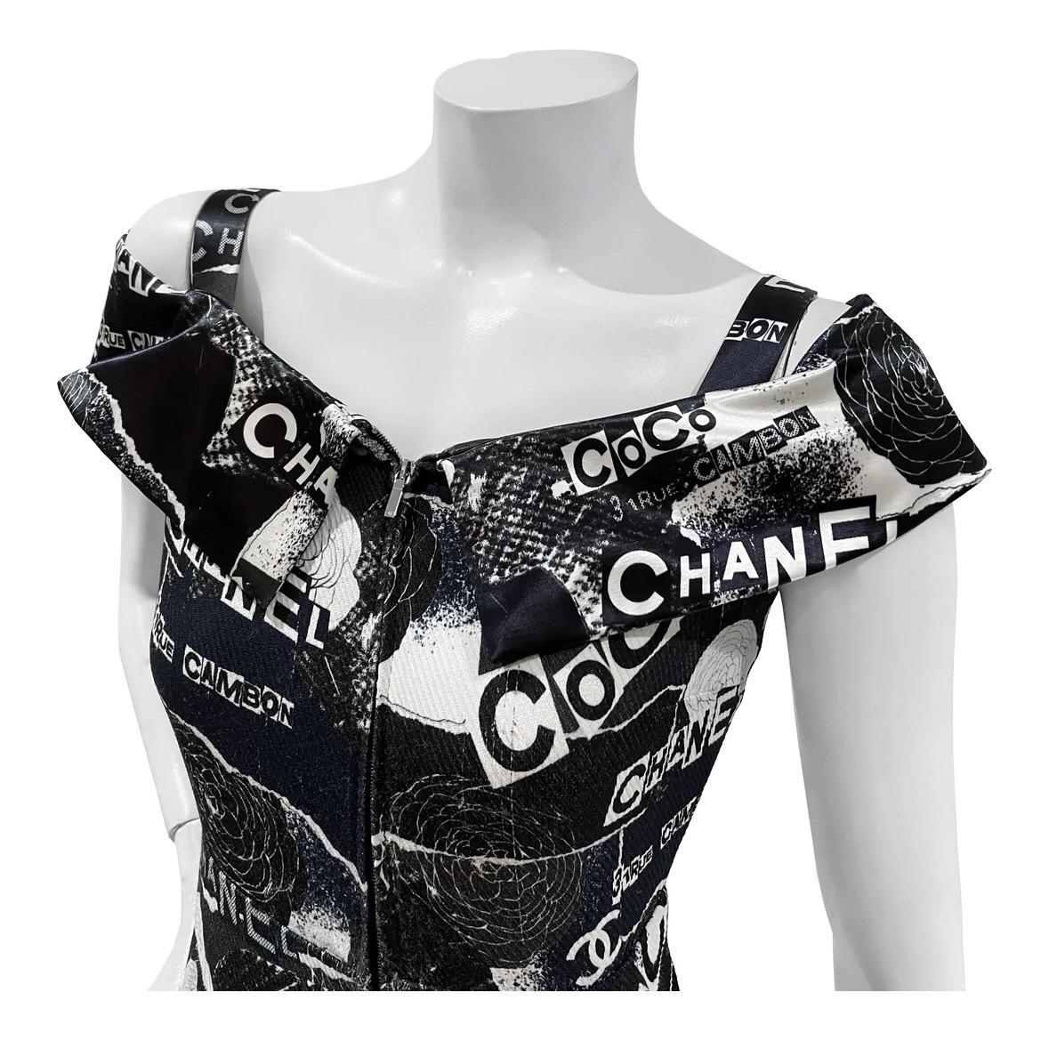 Sleeveless Logo Print Jumpsuit by Chanel
Spring / Summer 2020 Ready-To-Wear
Made in France
Navy and white 'Coco Chanel' and floral print detail
Invisible front zipper closure
Dual front pockets
Subtle pleat detail near pockets
Satin 'off shoulder'