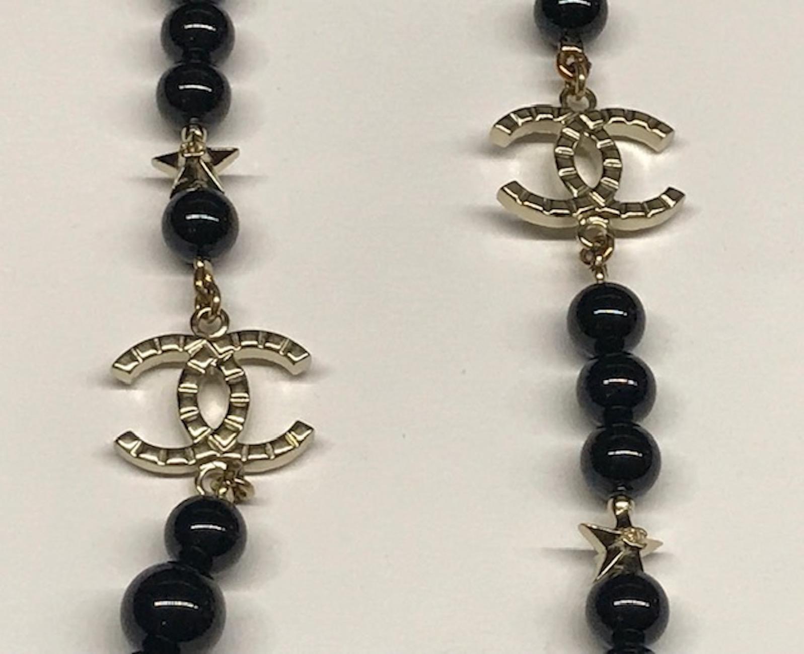 Women's or Men's Chanel Long Black Glass Bead & Star Necklace, 2017 Cruise Collection