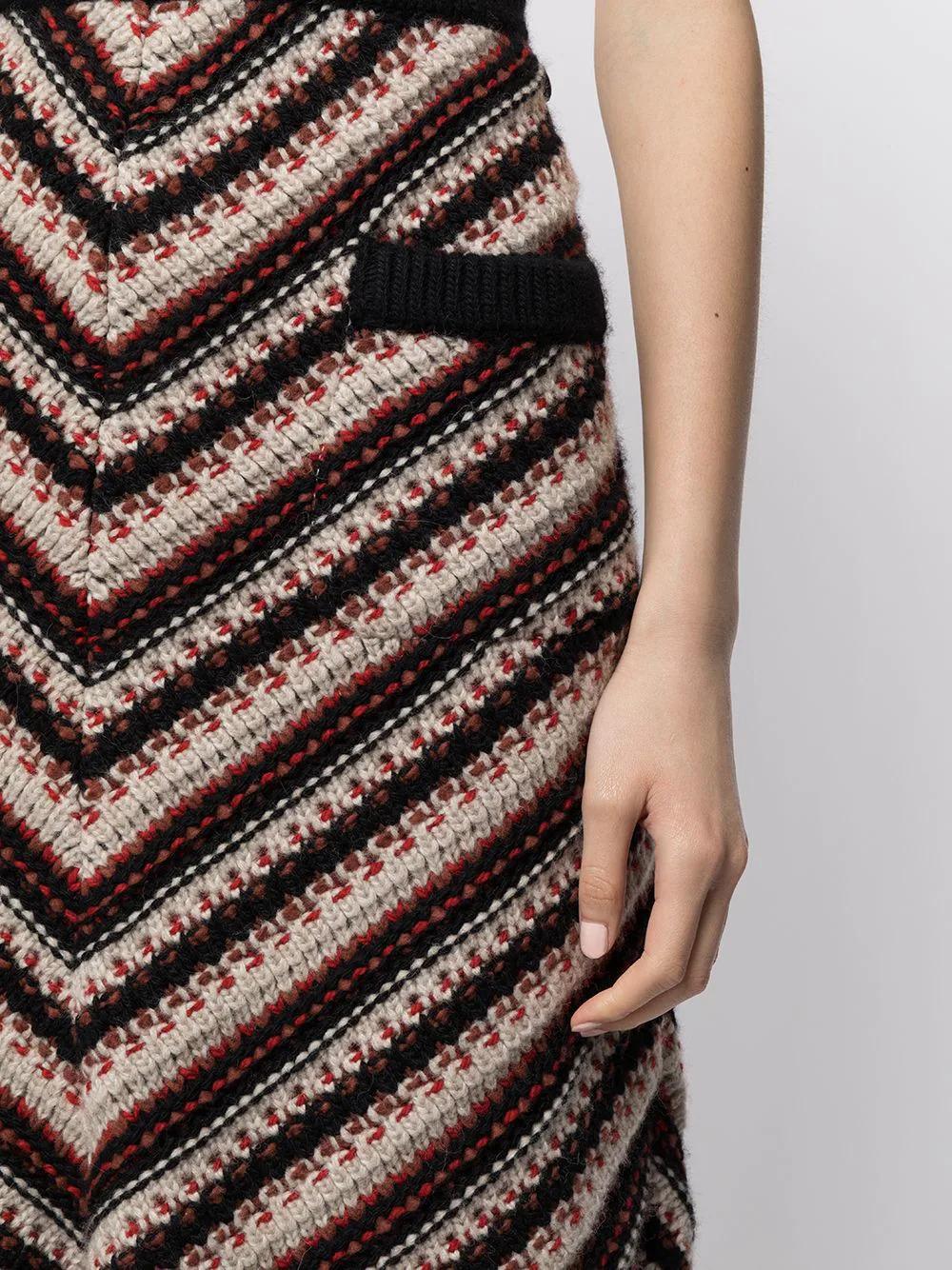 This pre-owned patterned skirt comes from the 2014 Dallas pre-fall collection, crafted from a cashmere and wool blend it takes inspiration from western-style. The skirt creates an effortless statement with a red black and beige chevron pattern