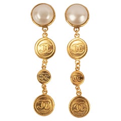 Chanel Long Golden Metal Clip-on Earrings with Pearly Cabochons, 1990s