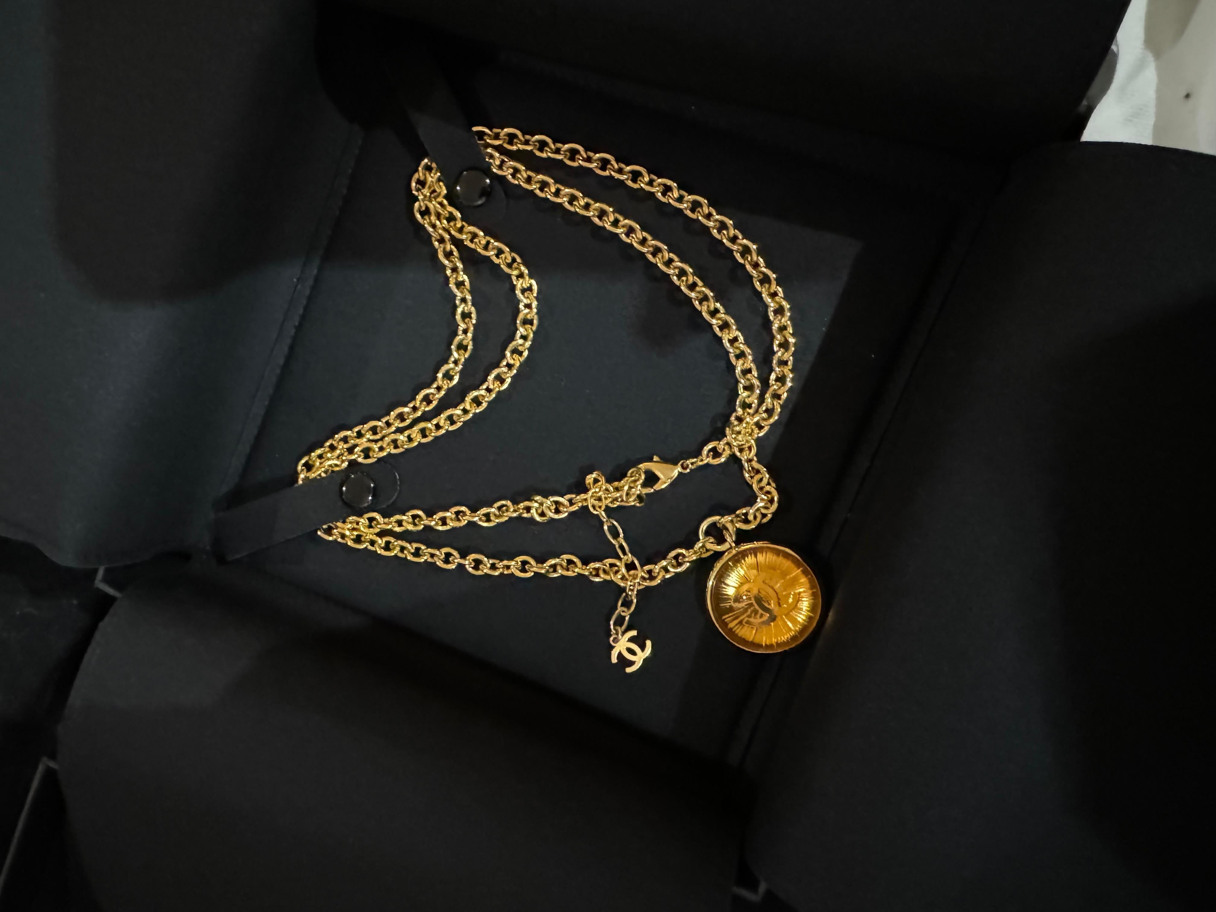 Contemporary Chanel long medallion necklace gold with chanel cc logo For Sale