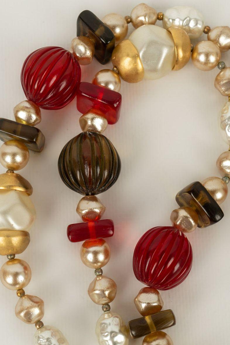 Chanel Long Pearly Pearls Necklace in Resin Beads and Gold Metal Elements 1