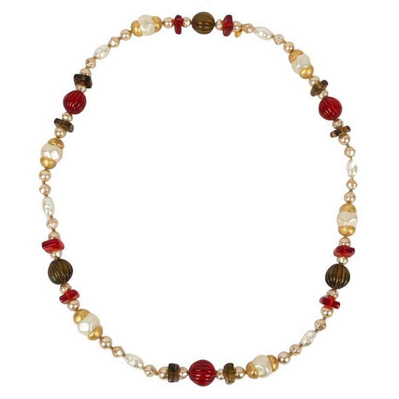 Chanel Long Pearly Pearls Necklace in Resin Beads and Gold Metal Elements