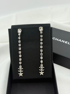 Chanel Long Silver Crystal Drop CC Star Earrings