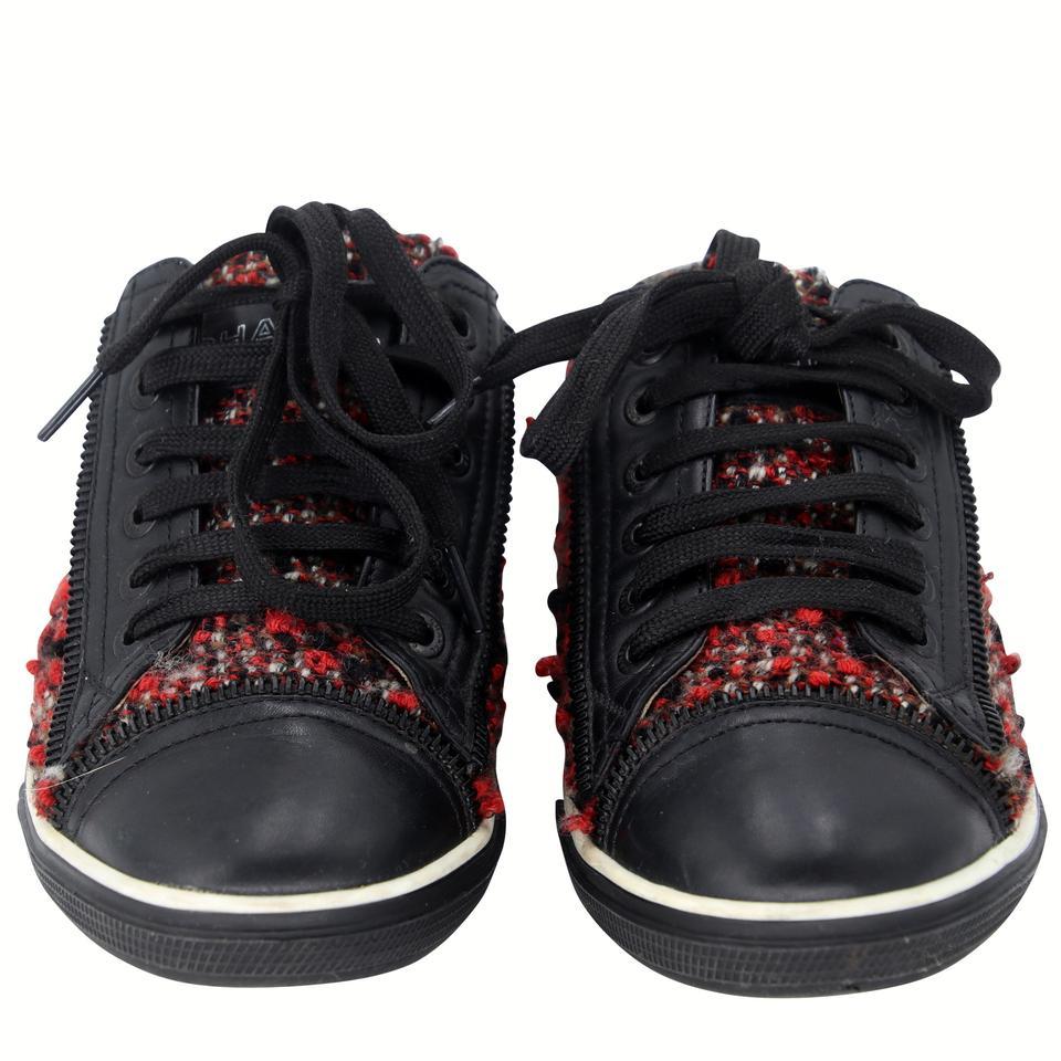 Chanel Low Top 35 Monogram Tweed CC Runway Sneakers CC-0308N-0061

From the 2018 Cruise Collection. These playful red & black sneakers with signmature Chanel tweed Canvas CC can enhance any style. These highly sought after espadrilles are a must