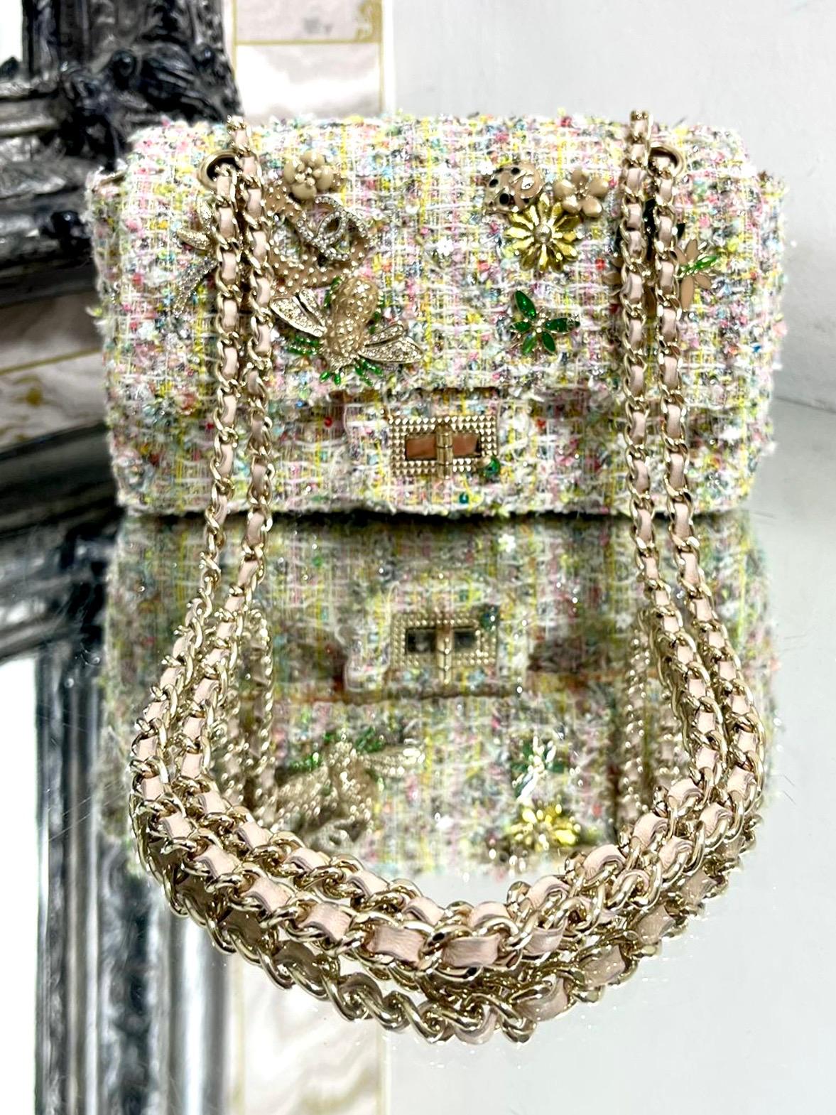 Ltd Edition - Chanel Ltd Edition Tweed Garden Party Charm Bag

From 2011 collection - Fantasy tweed bag in an array of colours.

Crystal and enamel charms adorned the front flap closure with 'CC'

logos, dragonflies and flowers. Signature re-issue