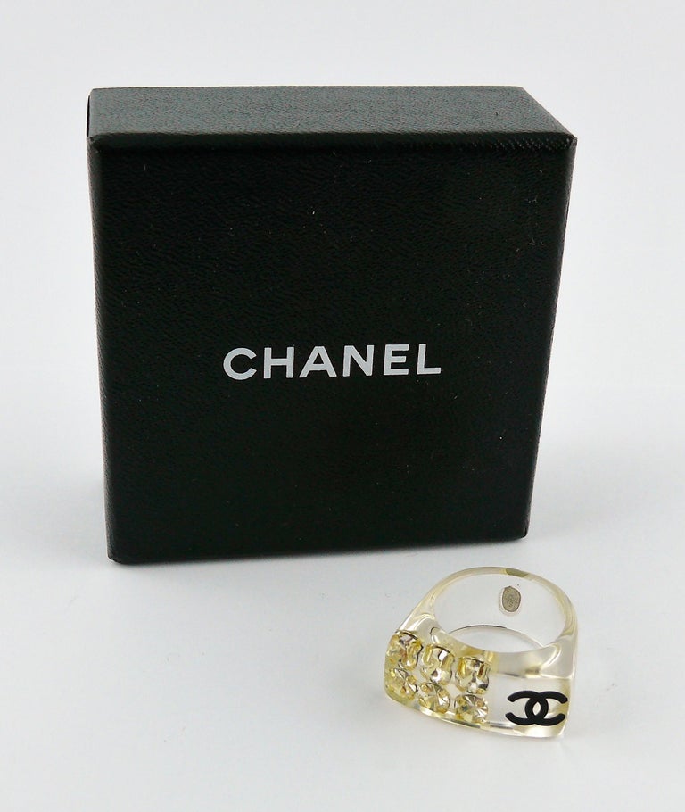 Chanel Lucite CC Logo Crystal Ring at 1stDibs  chanel logo ring gold,  chanel crystal ring, chanel ring logo