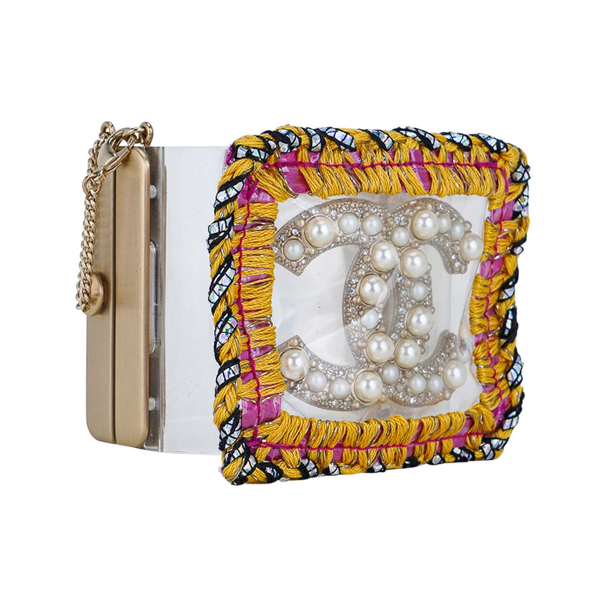 Mightychic offers a Chanel lucite, pearl and embroidered cuff bracelet.
Bold pearl CC encased in plastic with a bold embroidered edge.
Spring hinge closure.
This fabulous bold statement cuff is timeless and perfect to dress up or down.
Comes with