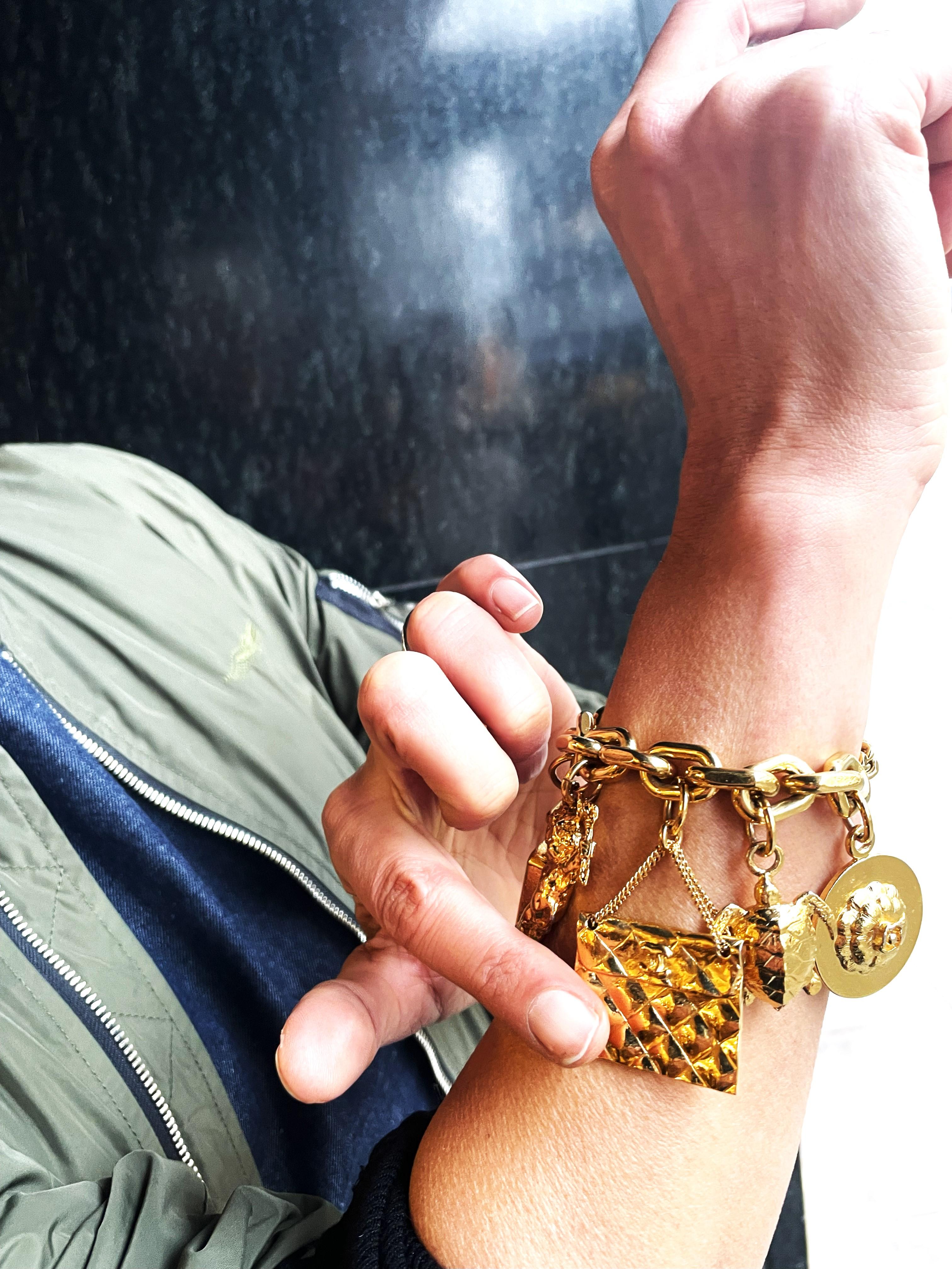 CHANEL lucky charm bracelet with 7 iconic Chanel pendants gold-plated, 1990 For Sale 5