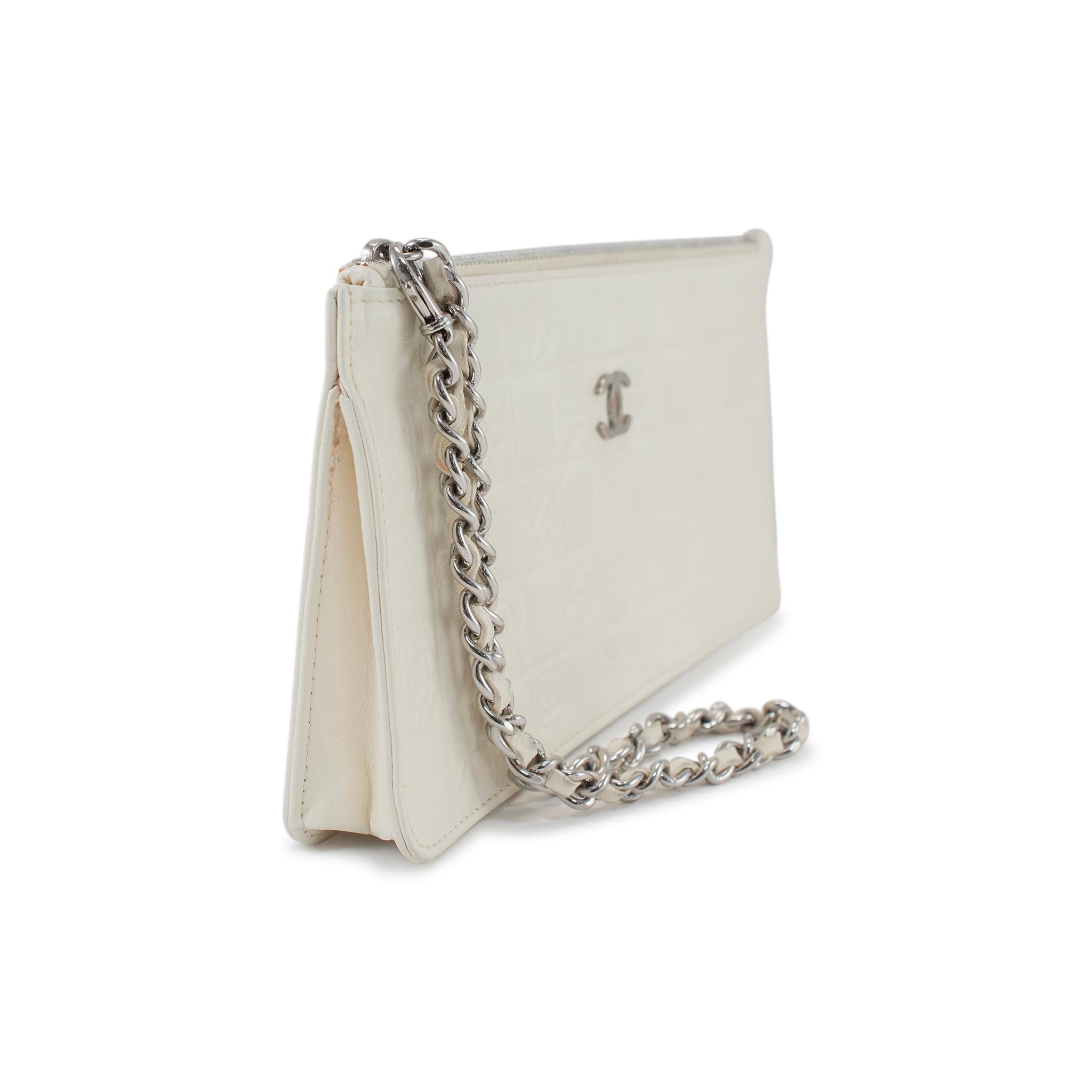 Chanel Lucky Charms Pochette Ivory Leather Handbag In Excellent Condition In Houston, US