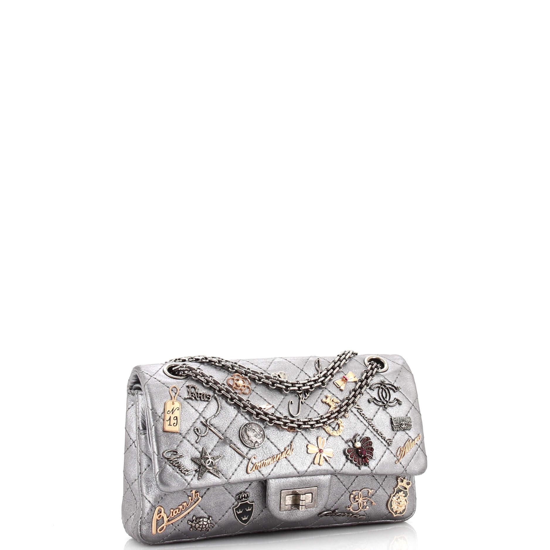 Condition: Good. Missing stud on flap embellishment. Creasing, moderate wear, scuffs and indentations on exterior, underneath flap and in interior, scratches on hardware.
Accessories: Authenticity Card, Dust Bag
Measurements: Handle Drop 11
