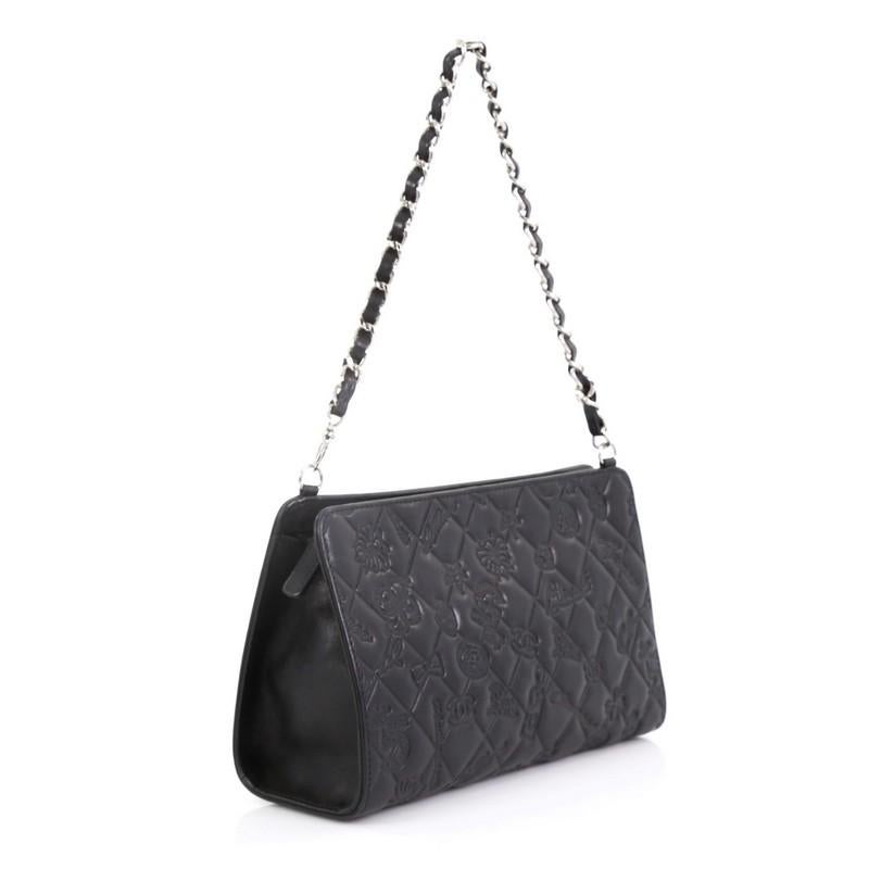 This Chanel Lucky Symbols Pochette Embossed Quilted Lambskin Small, crafted from black embossed quilted lambskin leather, features embossed unique lucky charm symbols such as Chanel No. 5, CC logo and shamrocks, woven-in leather chain straps and