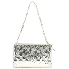 Chanel Lucky Symbols Pochette Embossed Quilted Patent