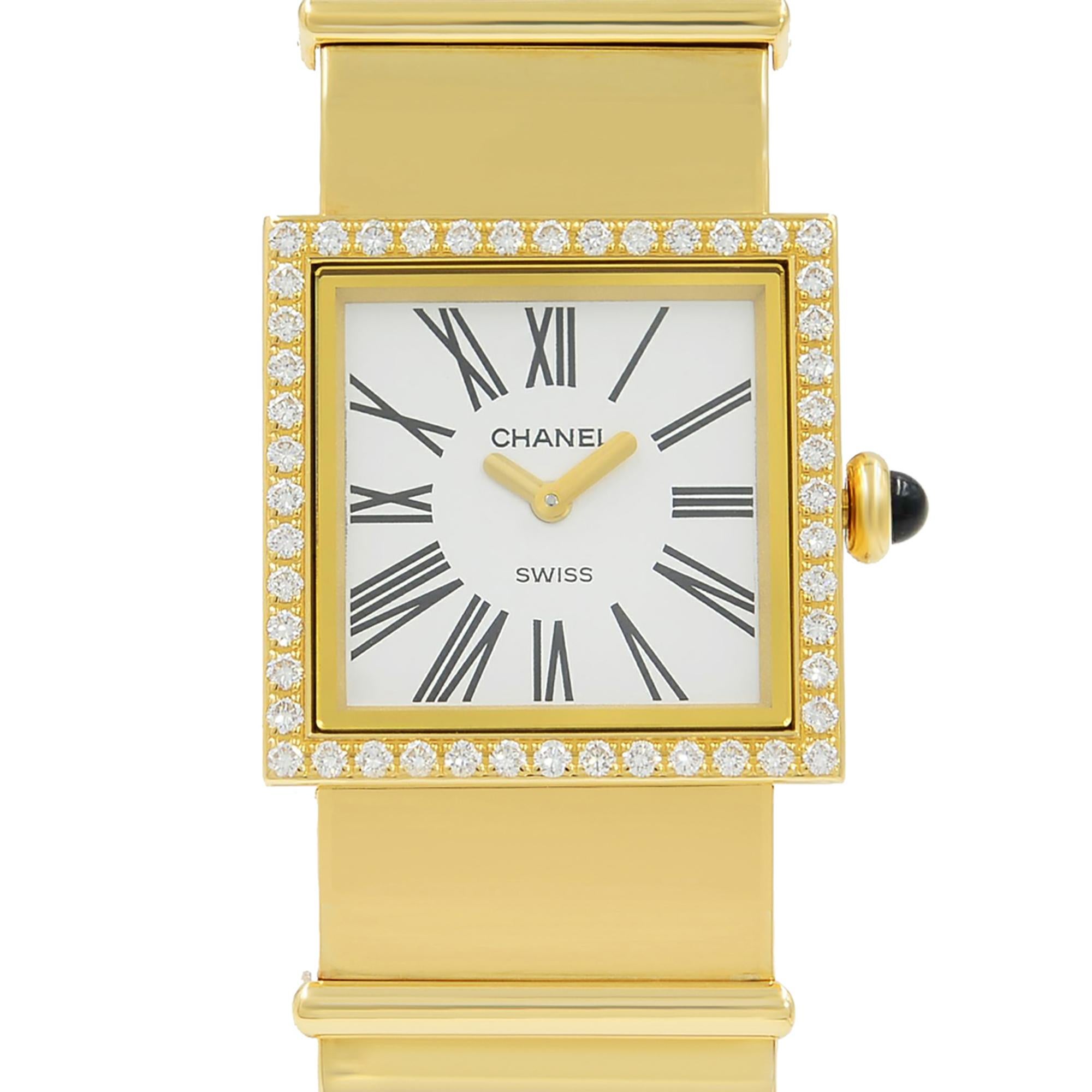 This pre-owned Chanel Mademoiselle  N/A is a beautiful Ladies timepiece that is powered by a quartz movement which is cased in a yellow gold case. It has a square shape face, diamonds dial and has hand roman numerals style markers. It is completed