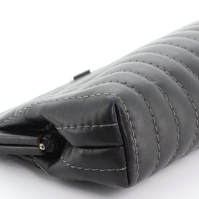 Chanel Mademoiselle Clutch Vertical Quilted Lambskin 2