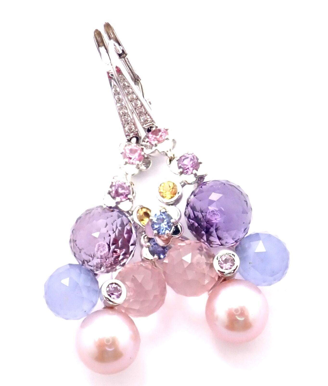 8k White Gold Diamond Amethyst Pearl Sapphire Mademoiselle Earrings by Chanel. 
With 12 Round Brilliant Cut Diamonds VS1 clarity, G color total weight approximately .12ct
Amethysts, Sapphires, Pearls
Details: 
Weight: 14.7 grams
Measurements: 47mm x