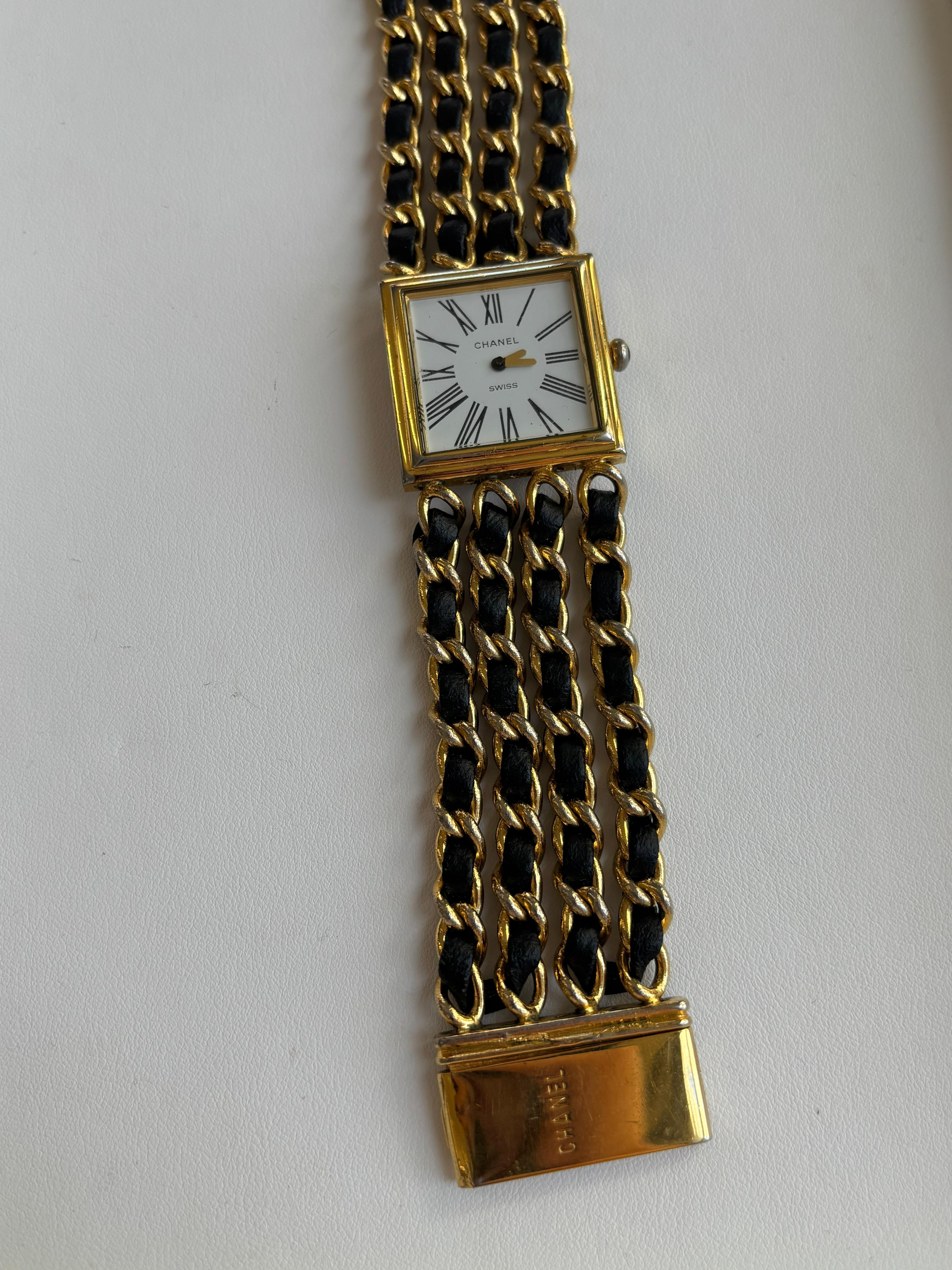 Reloj Chanel Mademoiselle Oro Amarillo 18K y Pulsera de Cadena de Piel Negra 7