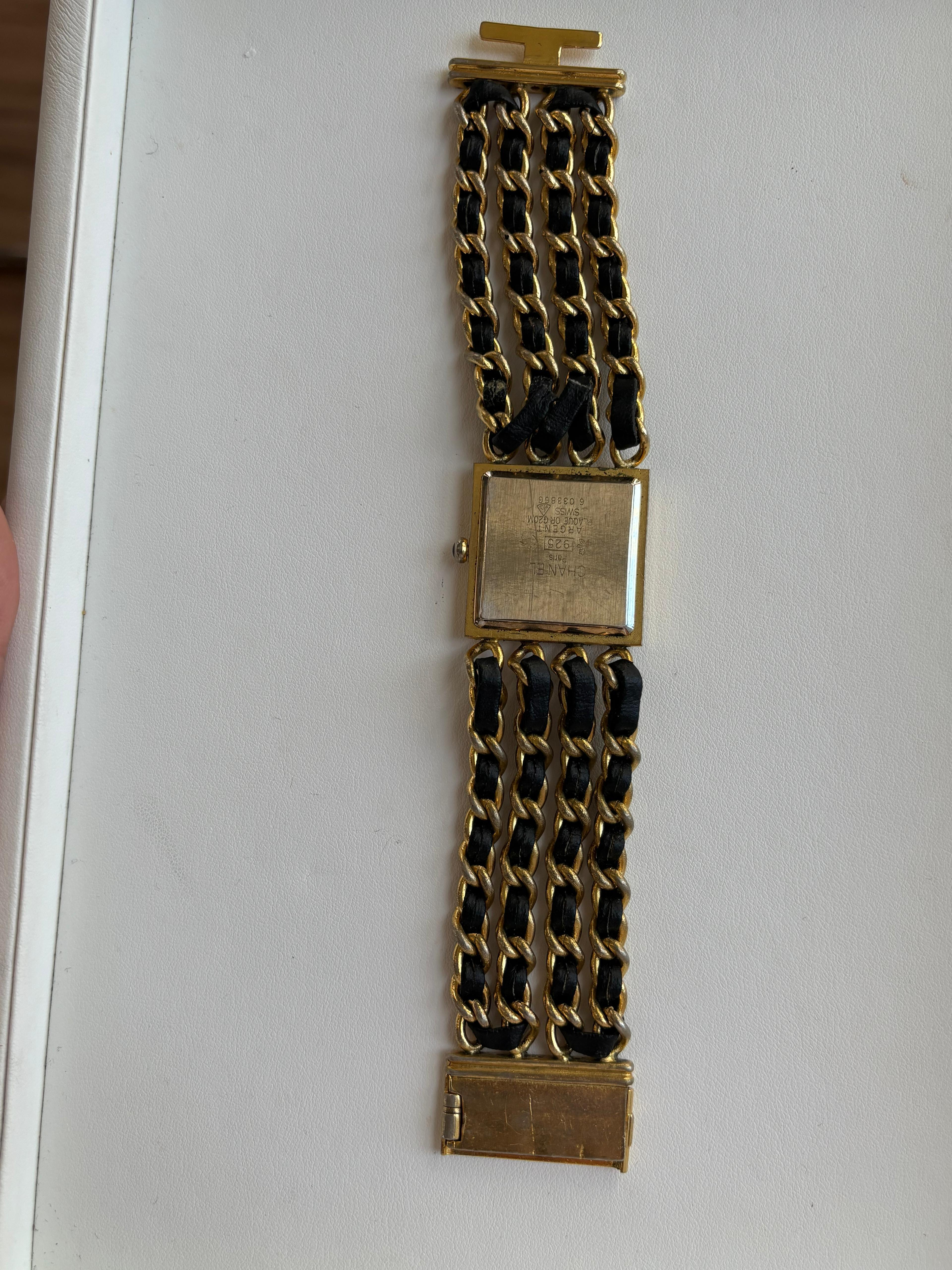 Reloj Chanel Mademoiselle Oro Amarillo 18K y Pulsera de Cadena de Piel Negra 10