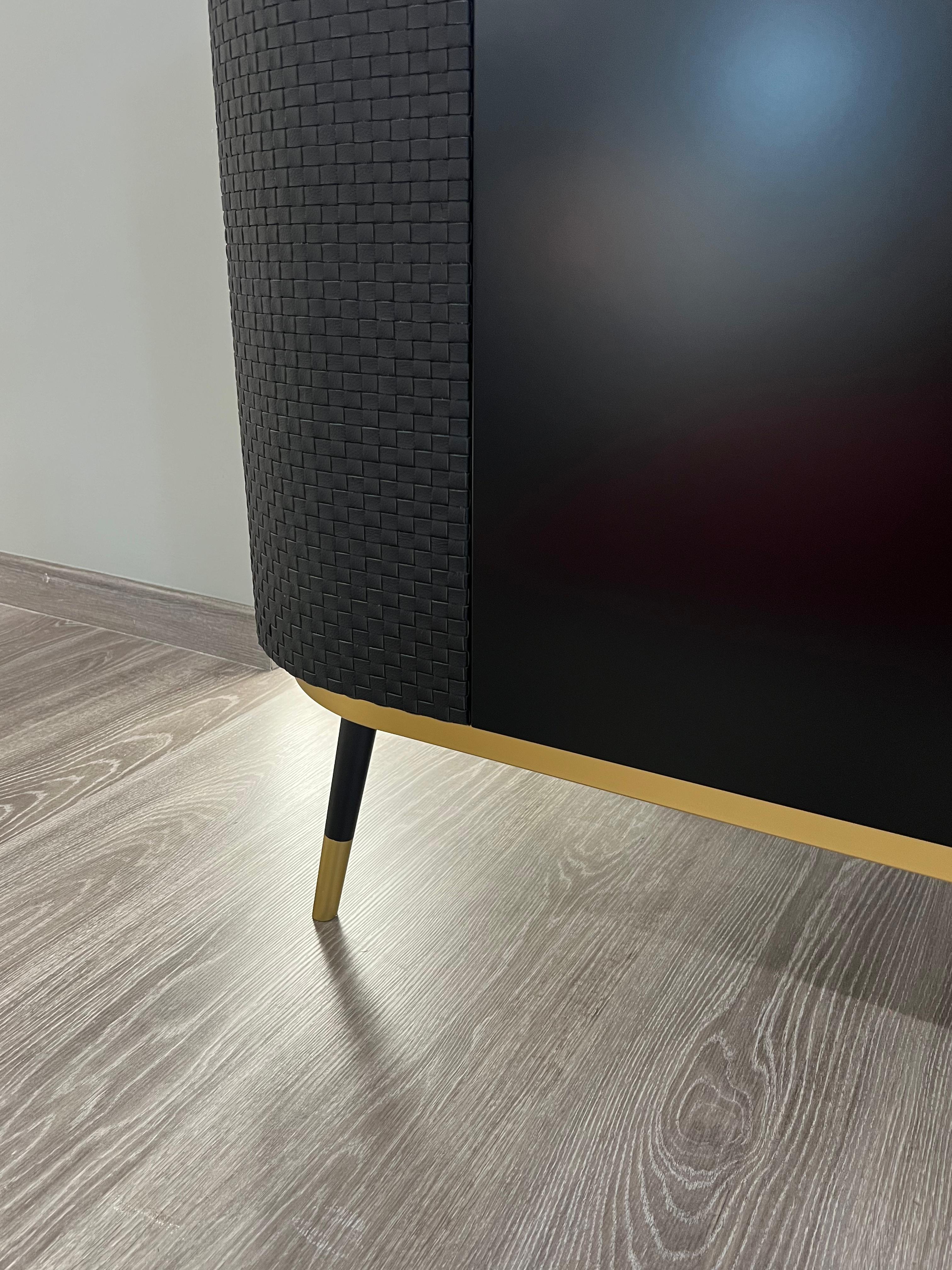 Leather Chanel custom black lacquered marble top sideboard , doors covered in woven leather For Sale