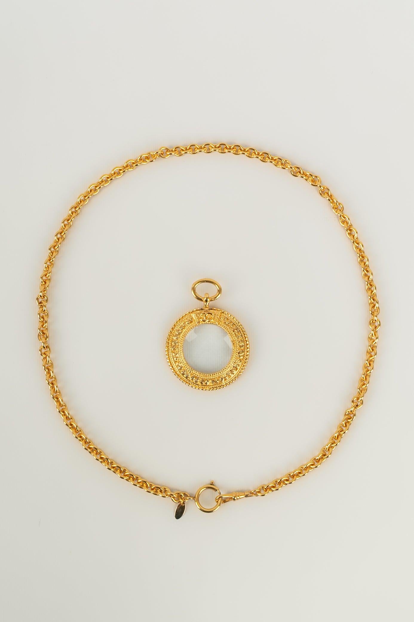 Chanel Magnifying Glass Necklace in Gold Plated Metal 1