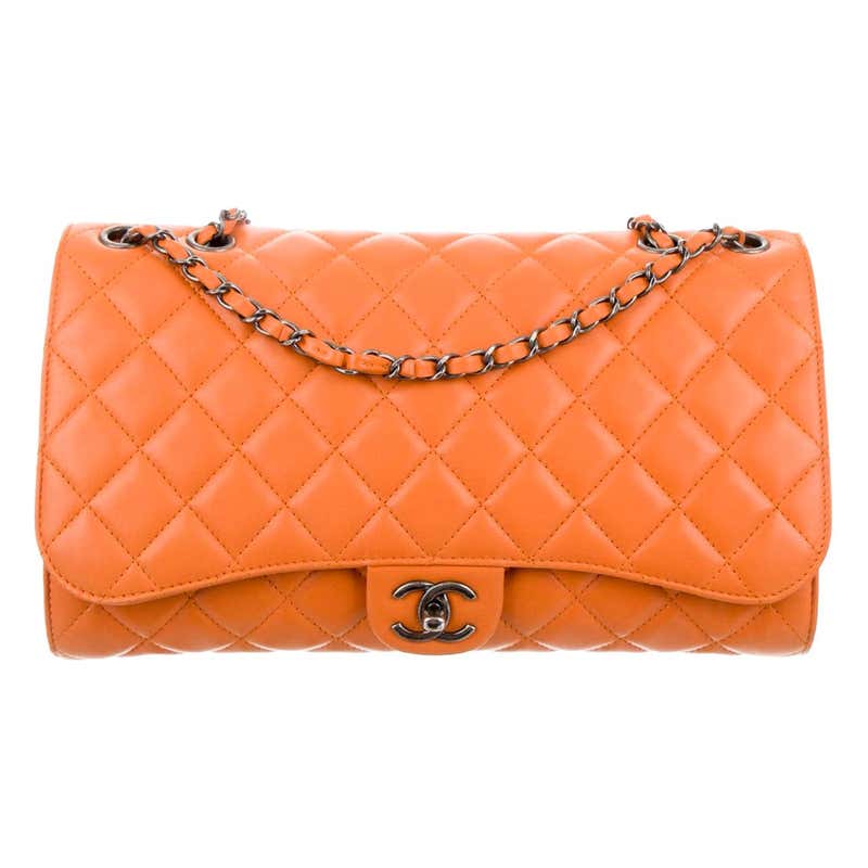 Chanel 1990s Orange Quilted Leather Bucket Bag at 1stDibs