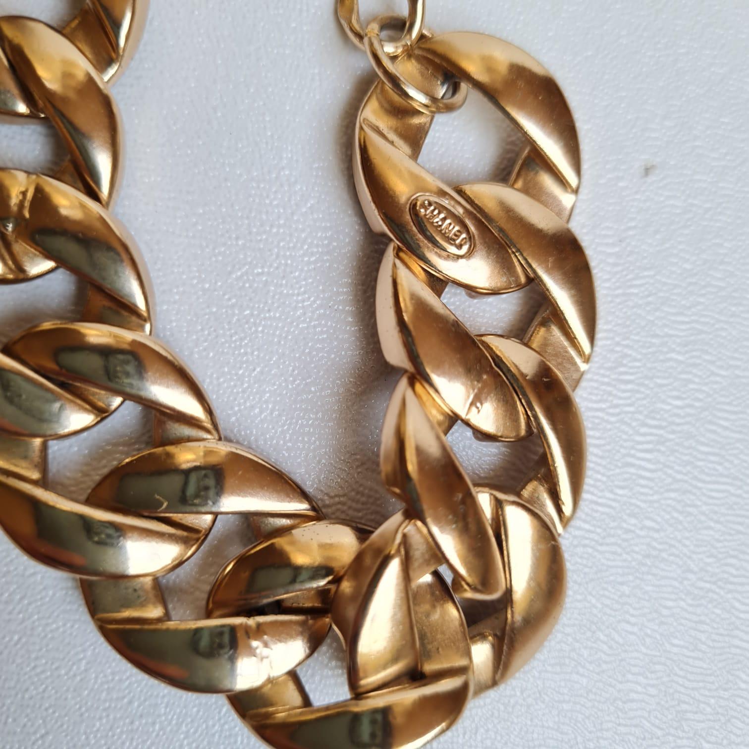Beautiful chanel chain enamel necklace from 2012. Overall in great condition with light hairline scratches. Reversible as well, can use the gold surface part outside. Comes as is.
