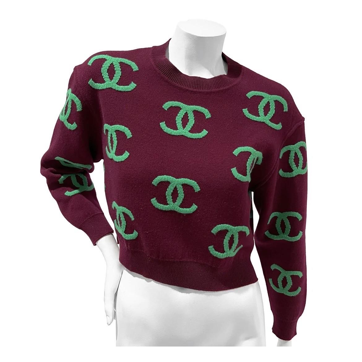Maroon with Green CC Logo Print Cashmere Sweater by Chanel
Spring 2021
Made in Italy
Maroon with green CC logo print detail
Long sleeve
Slip-on
Crew neck 
Ribbed elastic bottom hem with dual side slit detail
Fabric Condition; 97% Cashmere, 3%