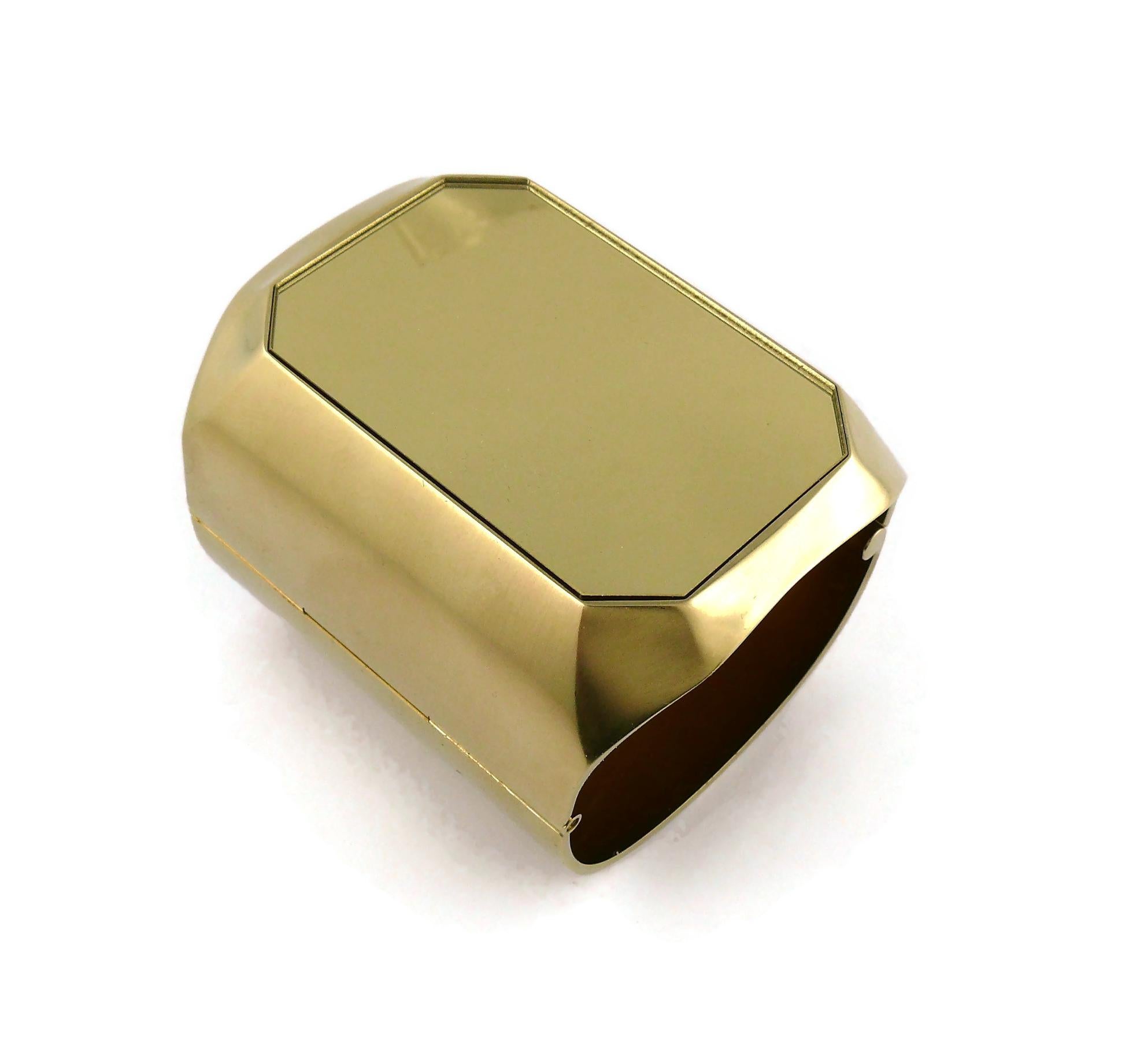 Chanel Massive Gold Toned Mirrored CC Wide Cuff Bracelet at Chanel Massive Gold Toned Mirrored CC Wide Cuff Bracelet at