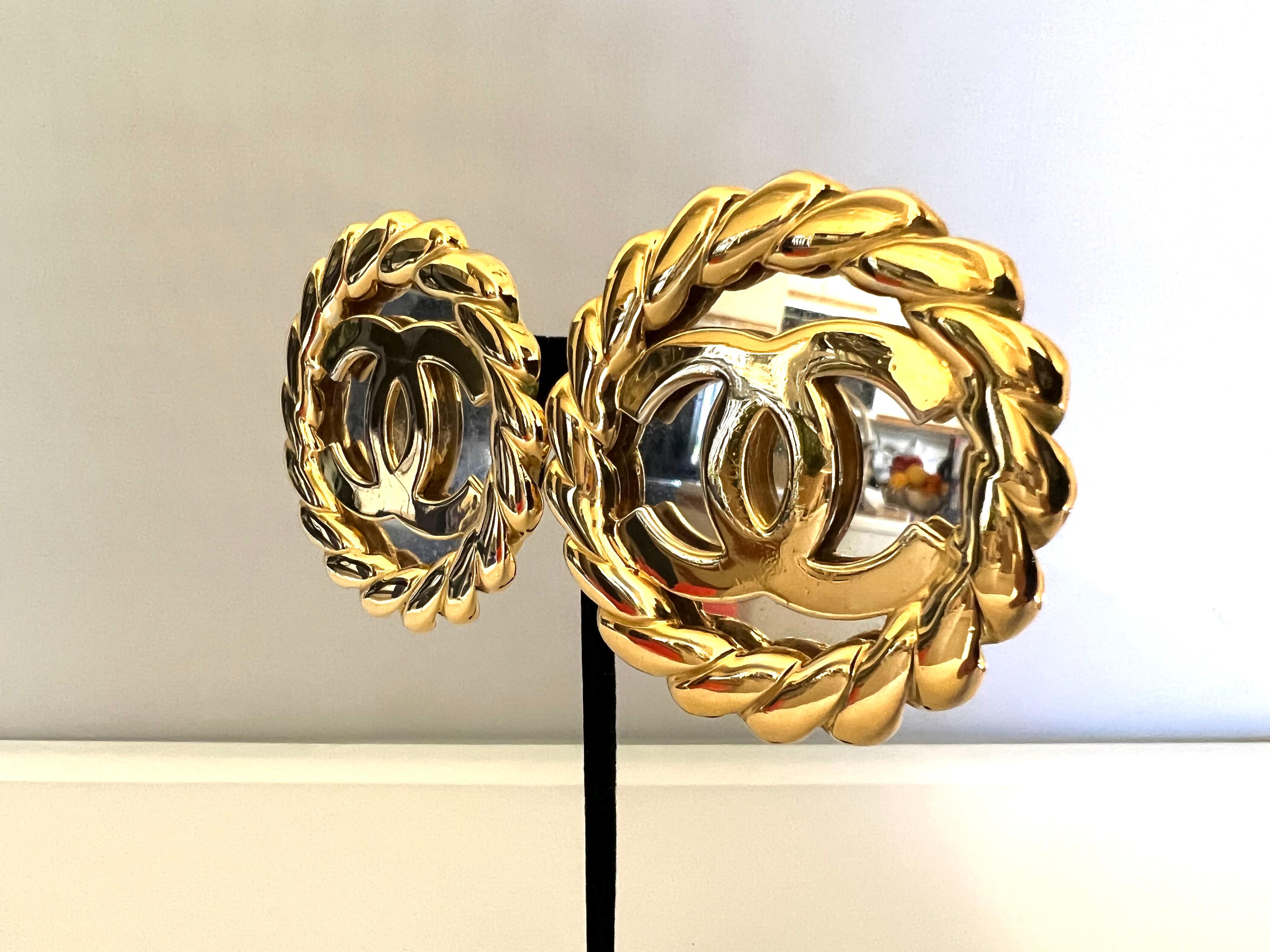 Extremely rare vintage Chanel round gilt mirrored double CC clip-on earrings - from runway collection 25, circa 1986. Signed Chanel on the back, please see the last three photos for reference. 
