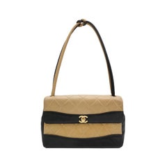 Chanel Matelasse 2.55 Bi-color Beige and Black Lambskin Leather Strap Bag