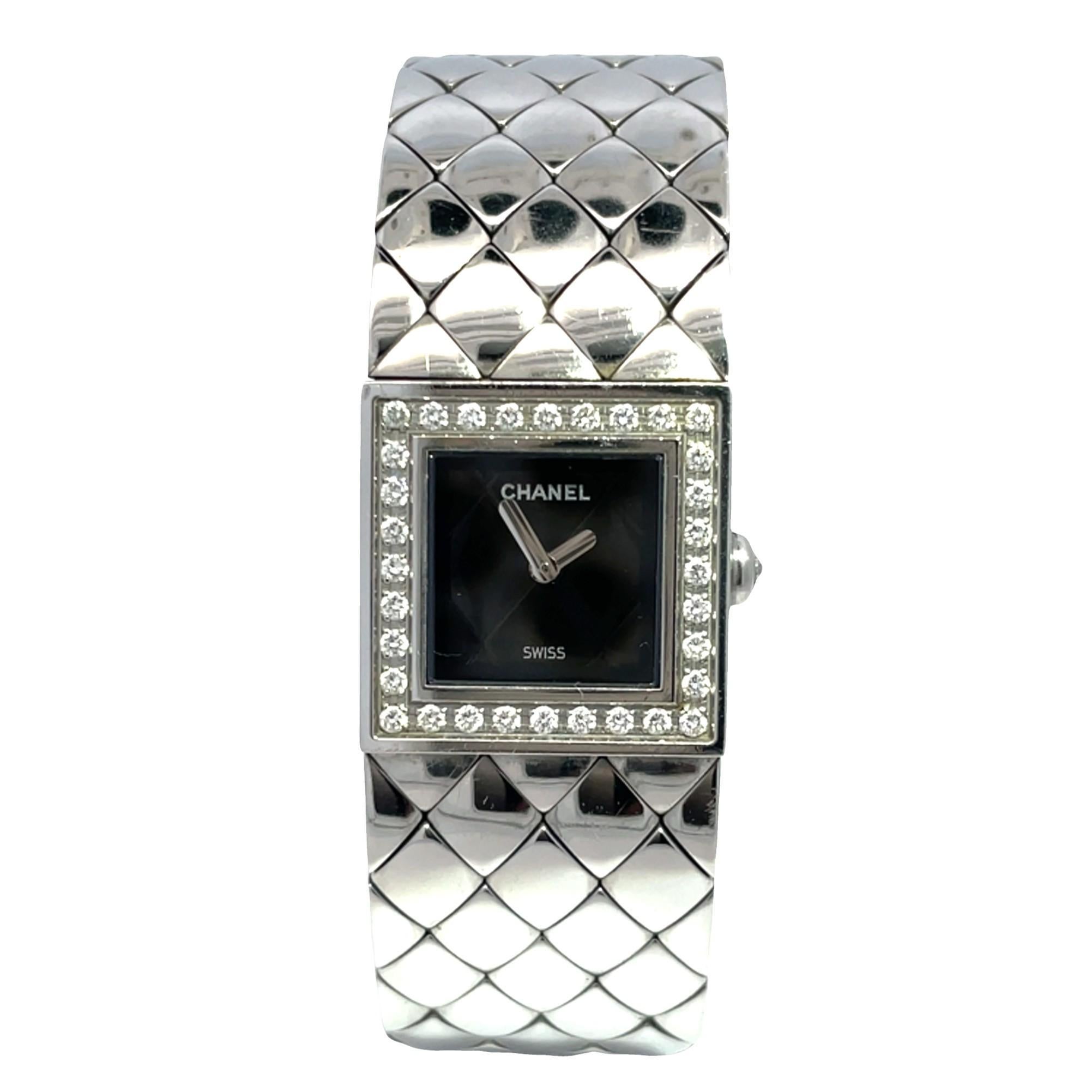 Introducing the elegant CHANEL ladies' watch, a masterpiece of refined design and luxury. This quartz Movement timepiece features a distinctive square face, offering a sleek and modern aesthetic.

Crafted with a stainless steel case and band, both