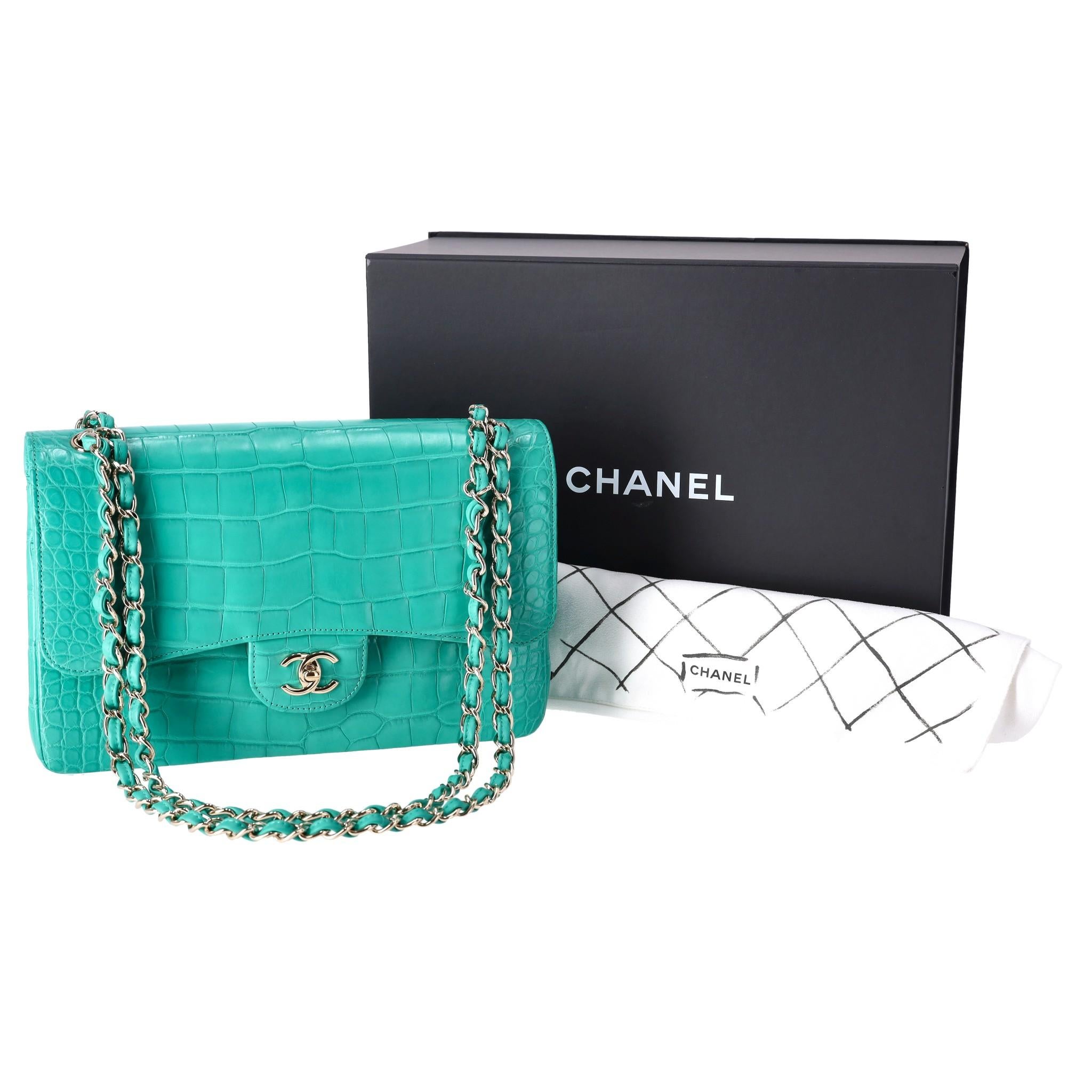 Rare Item - Chanel Matte Alligator Jumbo Double Flap Bag

Matte green iconic handbag crafted in Alligator skin and champagne gold hardware.

Double front flap and signature 'CC' turn-lock closure.

Intertwined chain-link strap and open pocket to