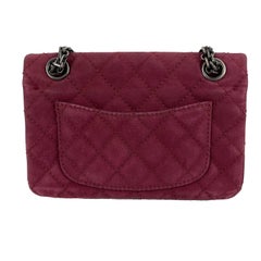 CHANEL- Caviar 2.55 Reissue Mini sac à bandoulière matelassé couleur framboise matelassé