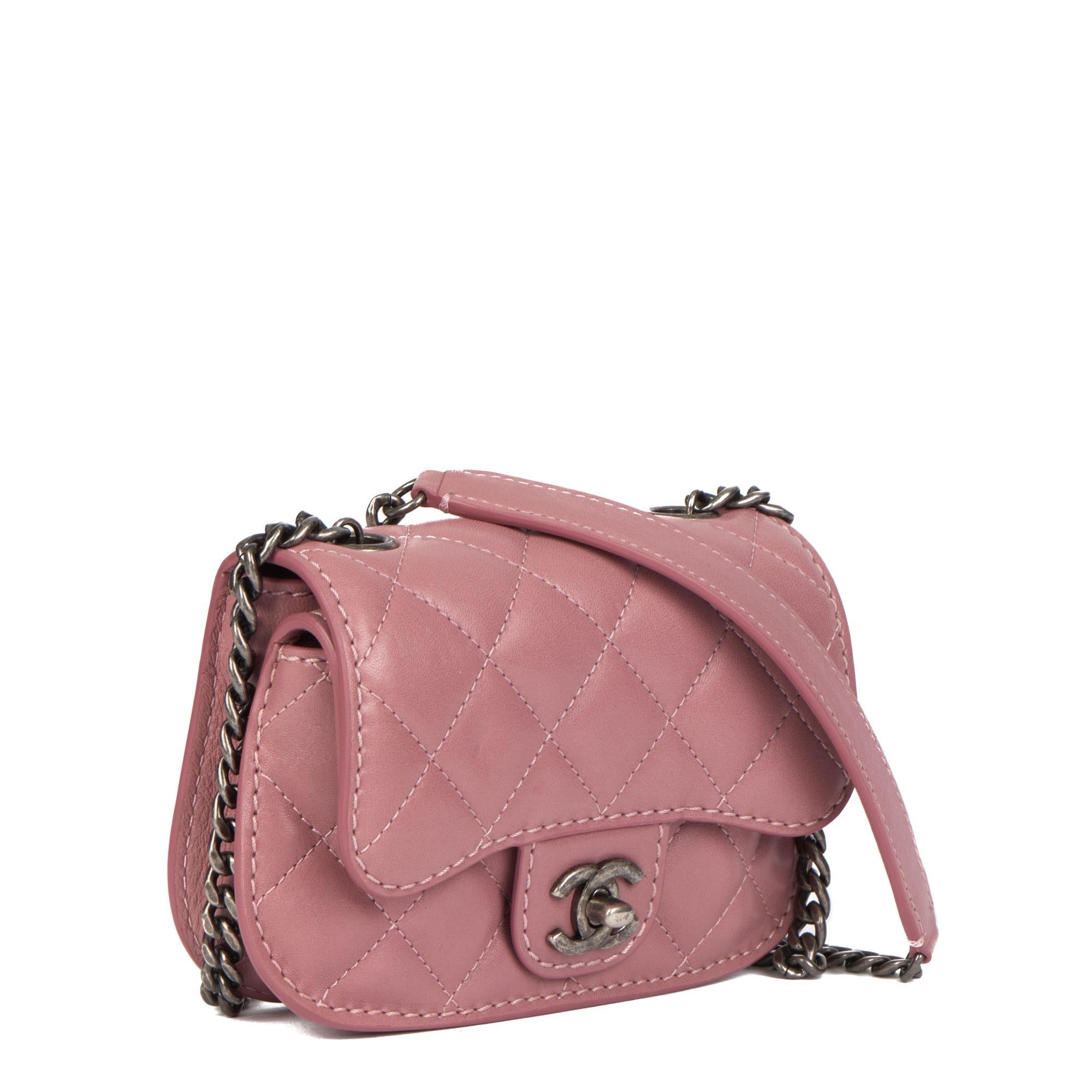 Chanel MAUVE QUILTED LAMBSKIN MINI FLAP BAG

CONDITION NOTES
The exterior is in excellent condition with minimal signs of use.
The interior is in excellent condition with minimal signs of use.
The hardware is in excellent condition with light signs
