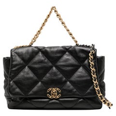 Chanel - Sac à rabat Maxi 19 