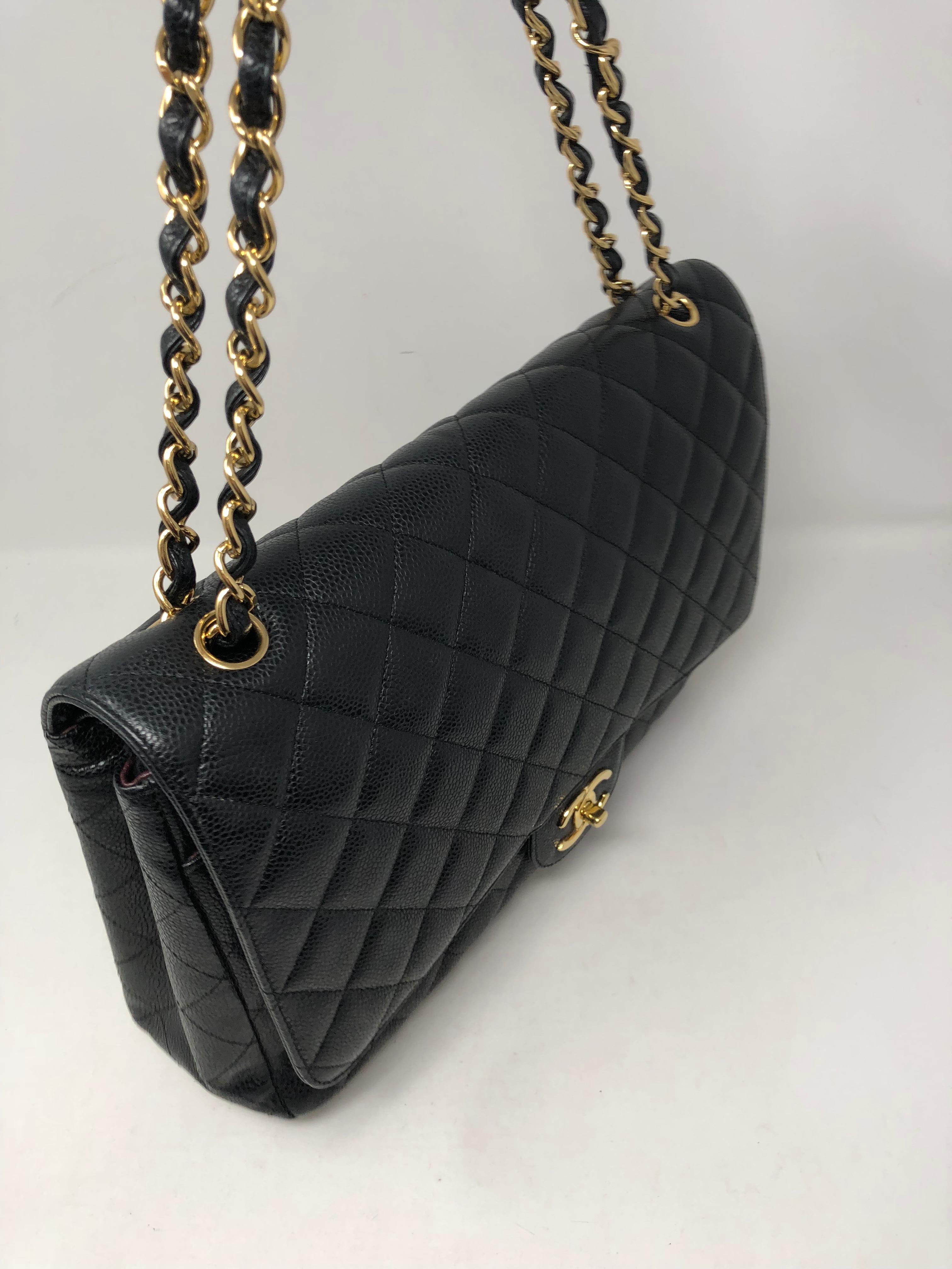 Chanel Maxi Black Caviar GHW Double Flap In Excellent Condition In Athens, GA