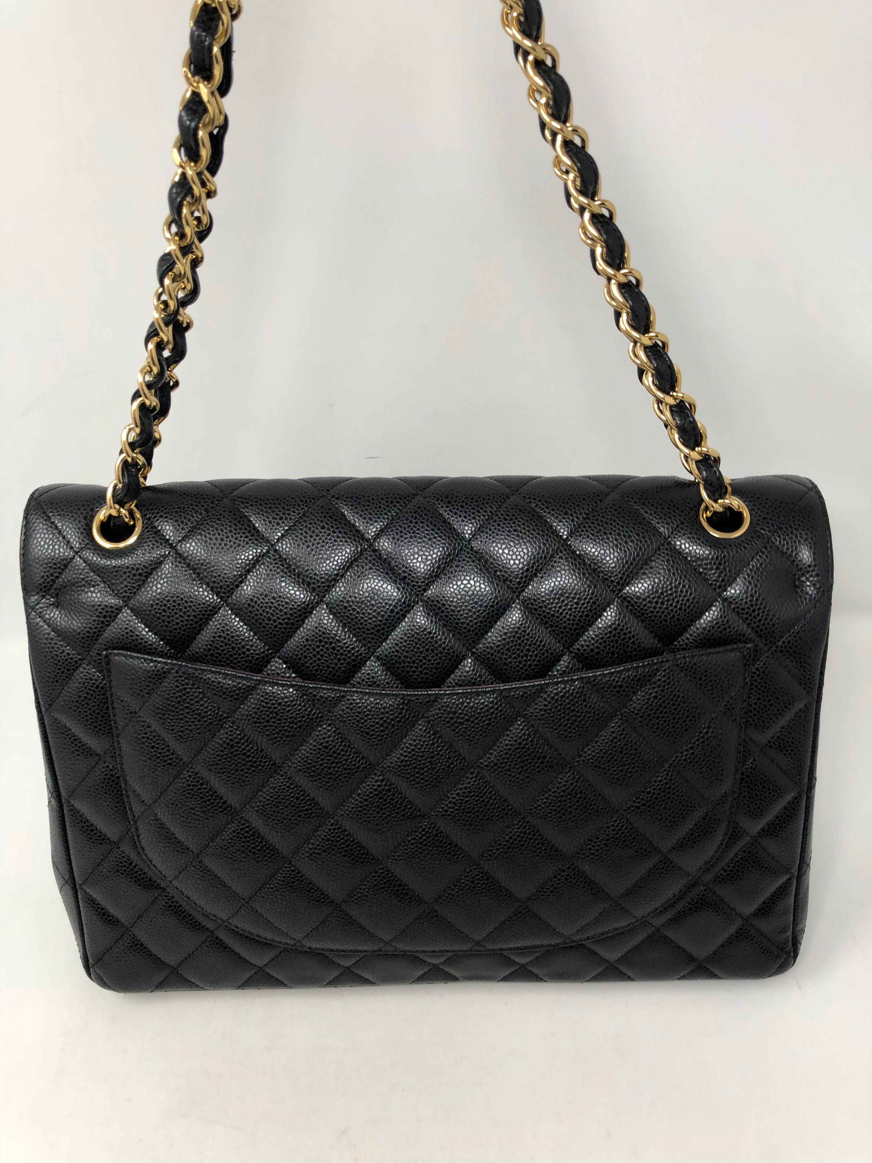 Chanel Maxi Black Caviar GHW Double Flap 4