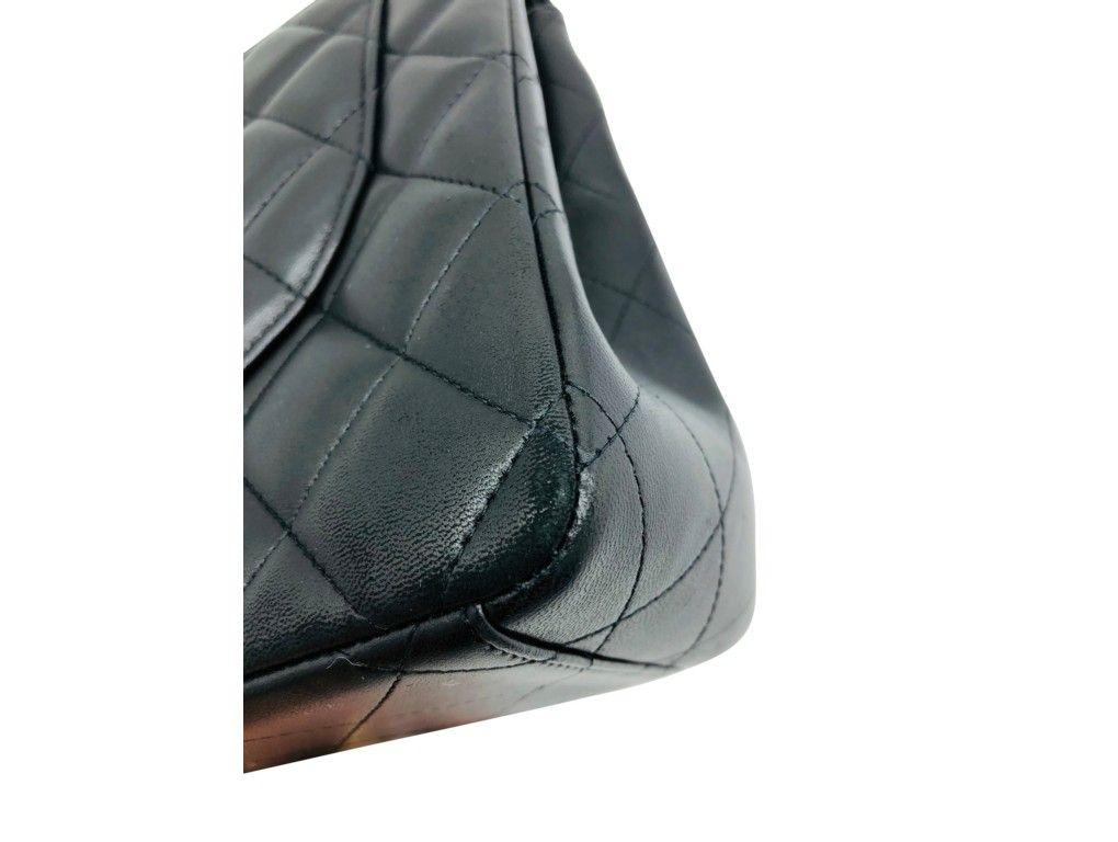 Women's Chanel Maxi Classic Flap Bag - Black Lambskin Gold Hardware For Sale