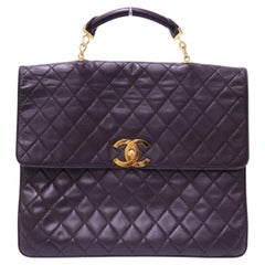Chanel Maxi Classic Flap Top Handle Bag in Black Lambskin