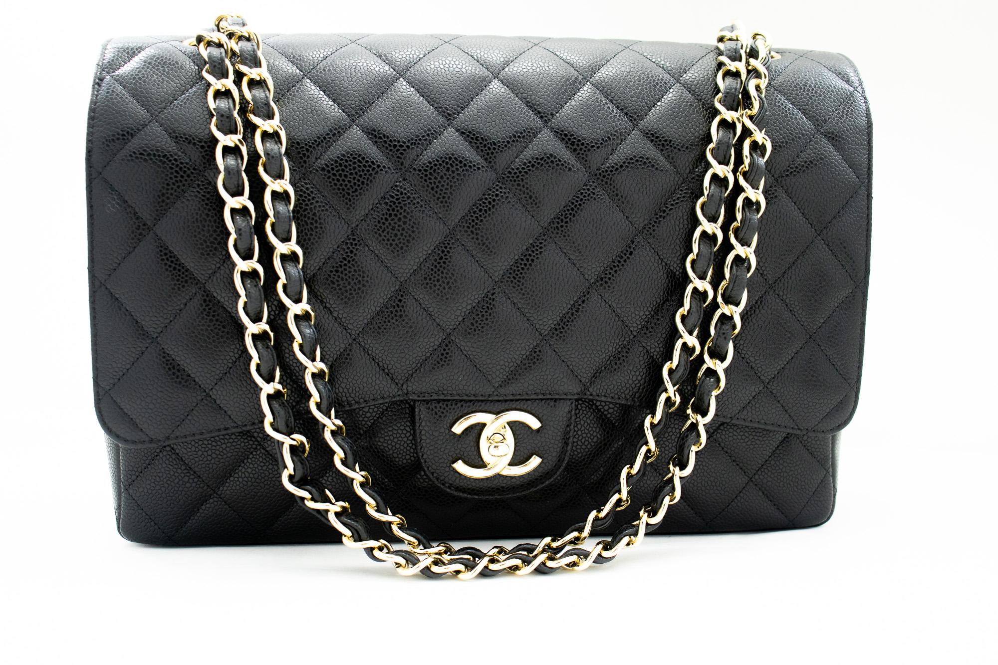 An authentic CHANEL Maxi Classic Handbag Grained Calfskin Double Flap Chain Shoulder Bag. The color is Black. The outside material is Leather. The pattern is Solid. This item is Contemporary. The year of manufacture would be 2011.
Conditions &