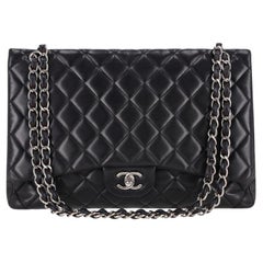 Chanel Maxi Diamond Quilted Lambskin Timeless Flap Bag